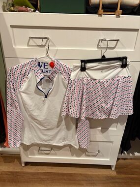 Kyodan quarter zip Top with Pink & Blue Geo Print Golf Skirt